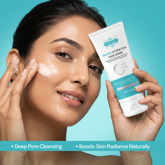 Costak Woman applying skincare product with a scrub packaging on a teal background