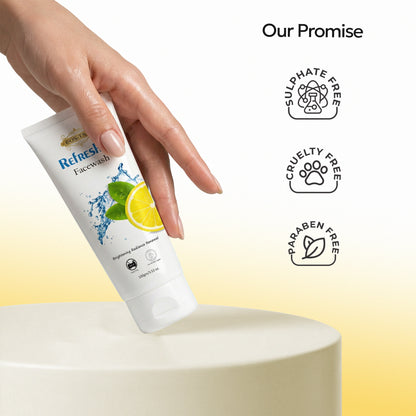 Costak Hand holding a tube of Refresh Facewash with brand promises on a light yellow background