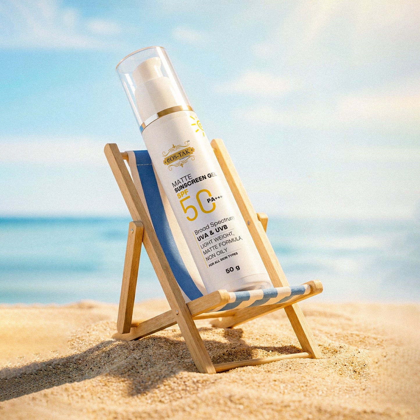 Costak Sunscreen bottle on a small wooden deck chair with a beach background